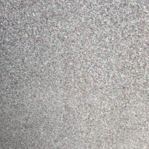 “Close-up view of Aadhunik Brown polished granite showing fine-grained crystal structure, subtle brown and grey mineral speckles, and dense texture. Detailed surface pattern ideal for showcasing stone quality for architectural and interior design projects.”